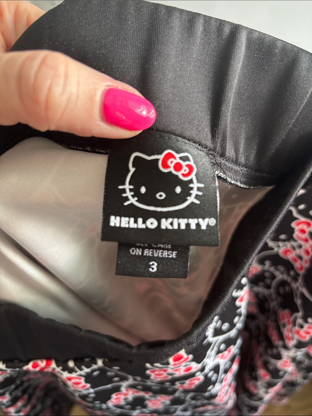 Hello Kitty Black Skater Skirt with Pink Bow Print - Picture 2 of 2